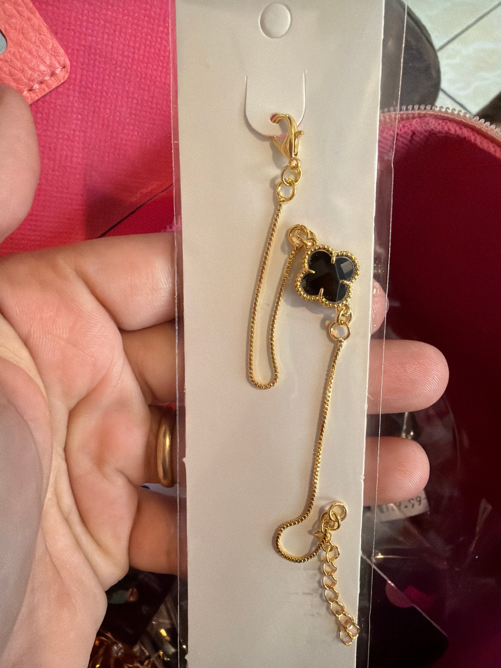 Pulseira trevo preto dourado